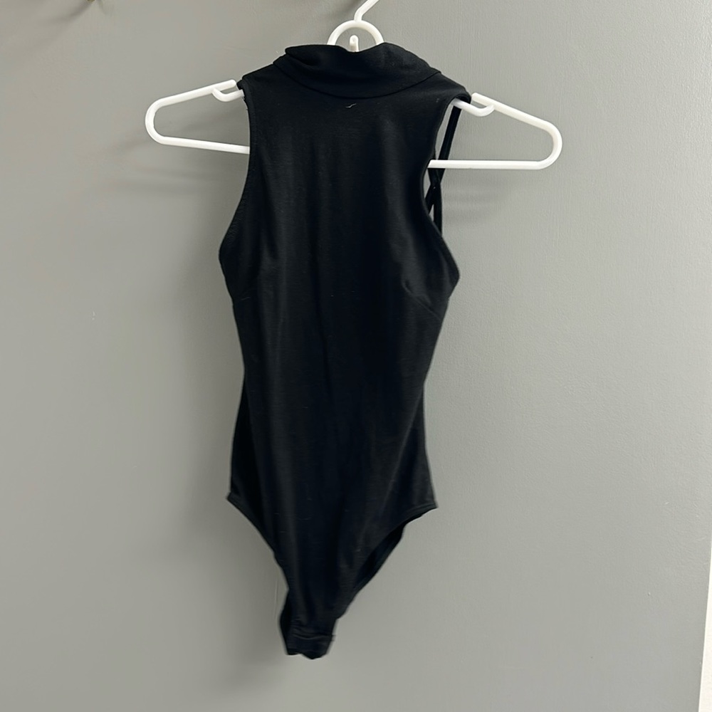 Turtle neck, open back bodysuit